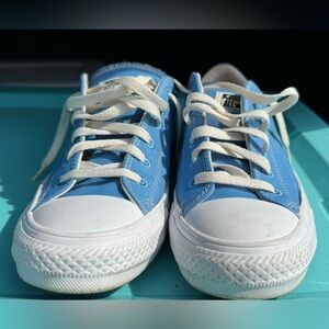 Light blue Size:8.5 converse. Only worn once! Like new